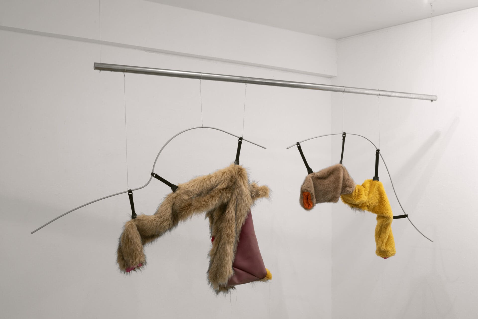 Tent (detail), 2019-2020, fur coats, sportswear, tent, latex, stainless steel, paint, steel cable